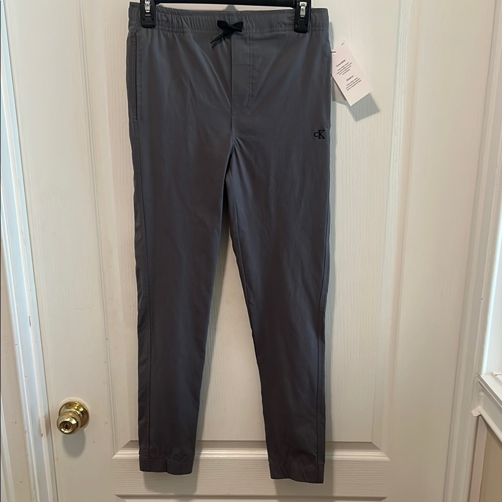 NWT Boys Calvin Klein Dark Gray Jeans. SZ 10/12.Straight fit-elastic at the hem.